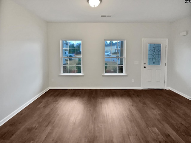 foyer featuring dark hardwood / wood-style floors