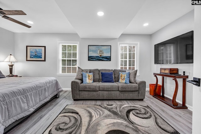 bedroom featuring light hardwood / wood-style floors and ceiling fan