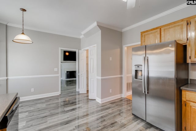 kitchen with light hardwood / wood-style flooring, appliances with stainless steel finishes, hanging light fixtures, ornamental molding, and light brown cabinetry