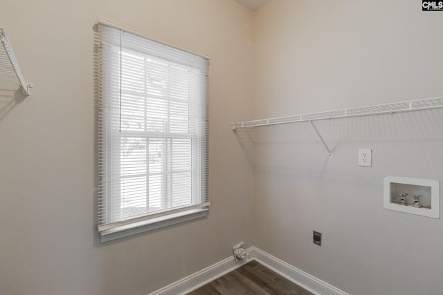 washroom featuring washer hookup, dark hardwood / wood-style floors, and hookup for an electric dryer