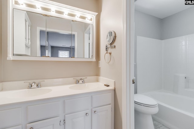 full bathroom featuring vanity, tub / shower combination, and toilet