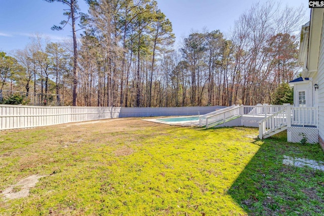 view of yard featuring a pool side deck