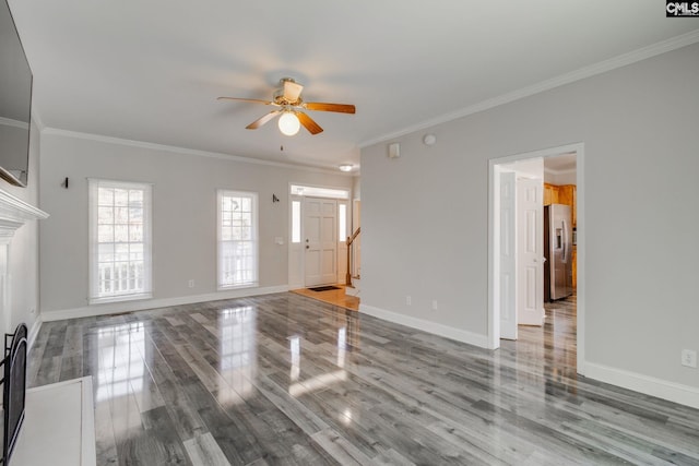 unfurnished living room with crown molding, hardwood / wood-style flooring, and ceiling fan