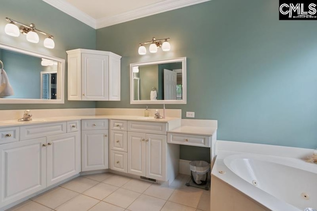 bathroom with vanity, tile patterned flooring, ornamental molding, and a tub