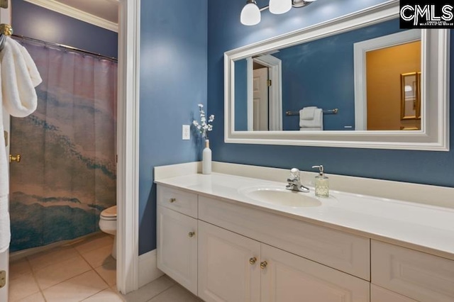 bathroom with vanity, curtained shower, tile patterned floors, and toilet