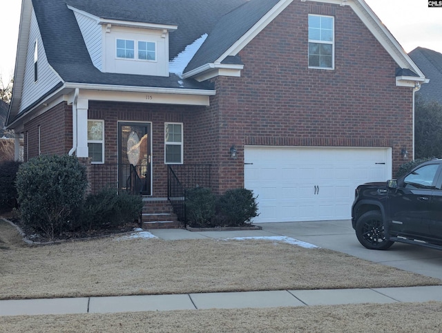 view of front of property with a garage