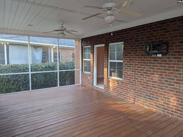 wooden deck with ceiling fan