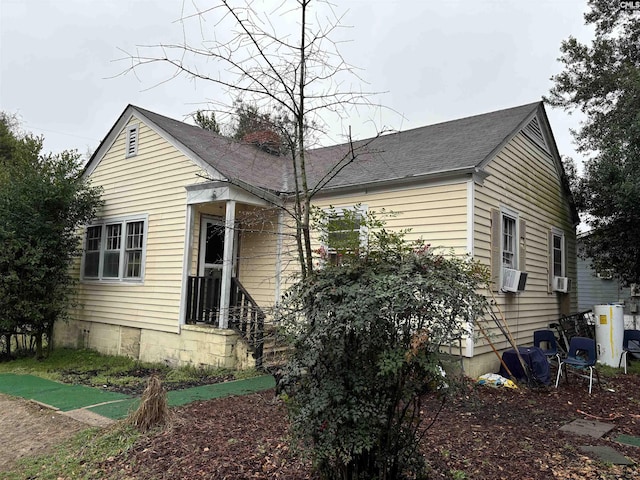 view of home's exterior featuring cooling unit