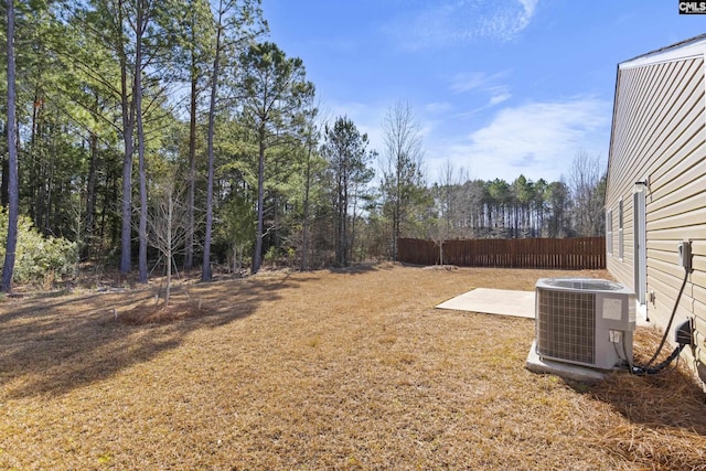 view of yard with central AC