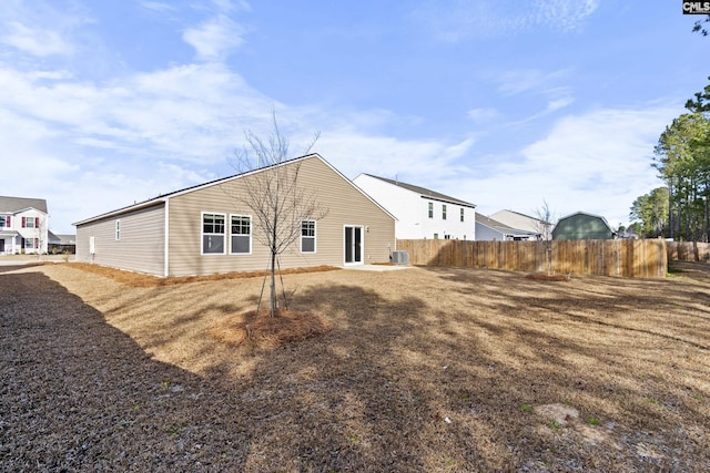 back of property with central AC unit