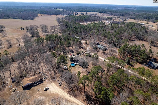 birds eye view of property featuring a rural view