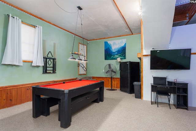 rec room featuring light carpet, pool table, and wood walls