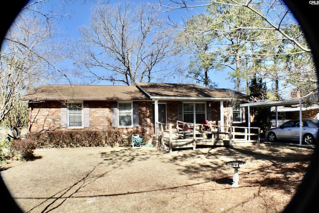 single story home with a carport