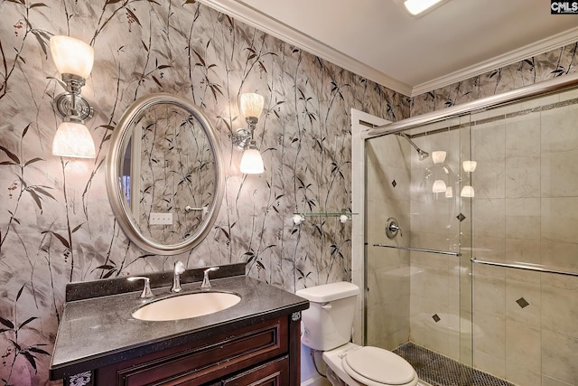 bathroom featuring a shower with door, ornamental molding, vanity, and toilet