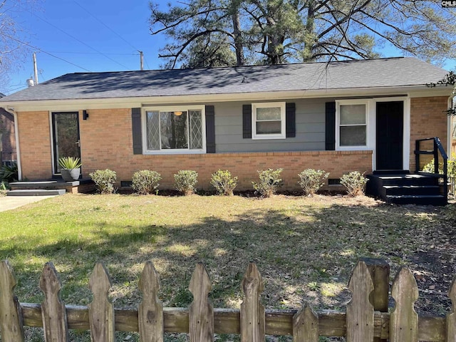 single story home with a front lawn