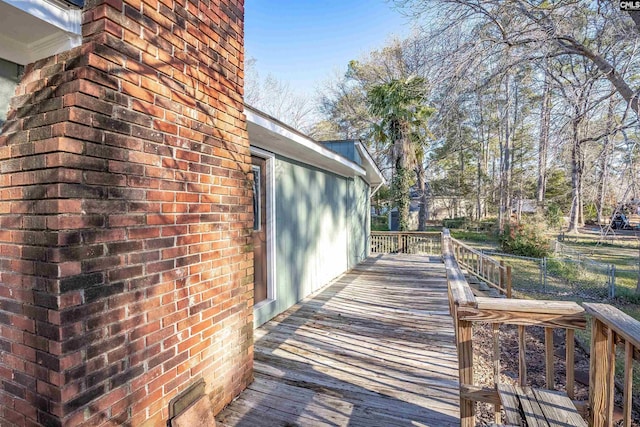 view of home's exterior featuring a deck