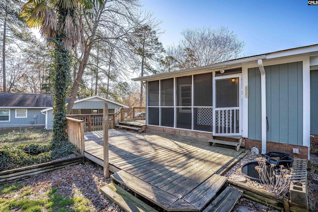 deck featuring a sunroom