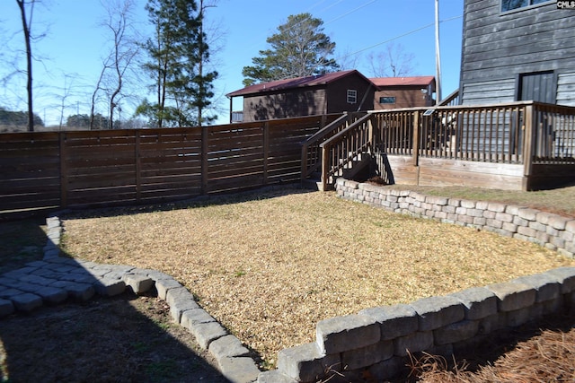 view of yard featuring a deck