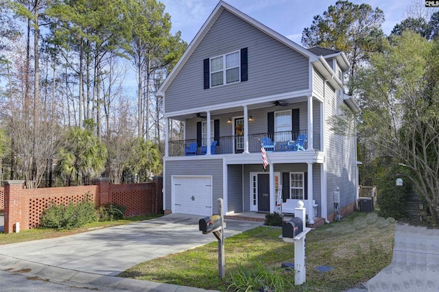 view of front property featuring a garage and a balcony