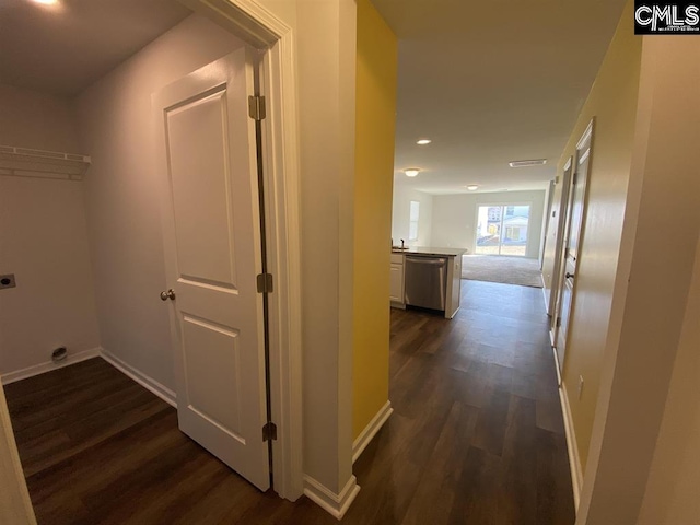 hall featuring dark wood-type flooring