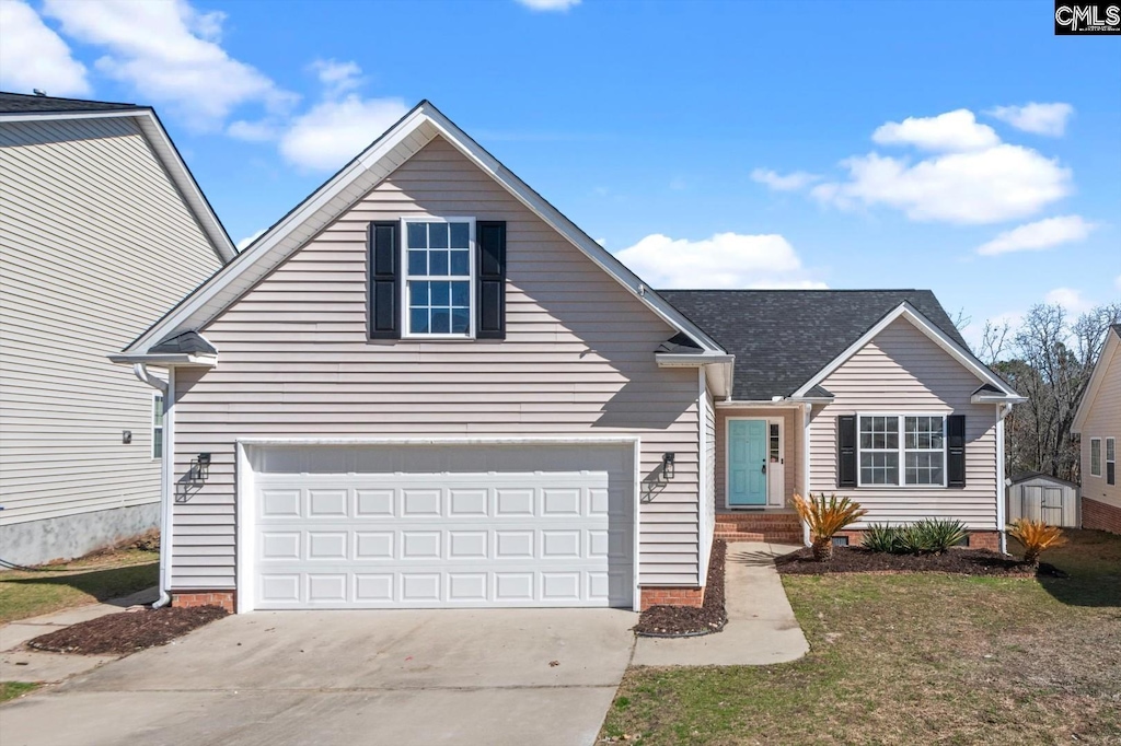 front facade with a garage and a front lawn