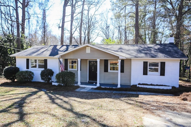 ranch-style house with a porch