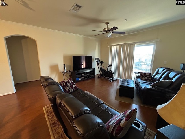 living room featuring ornamental molding, dark hardwood / wood-style floors, and ceiling fan