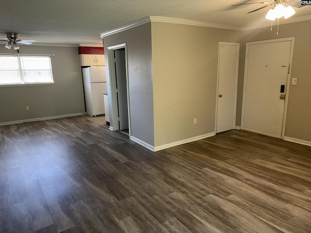 unfurnished room with crown molding, dark wood-type flooring, a textured ceiling, and ceiling fan