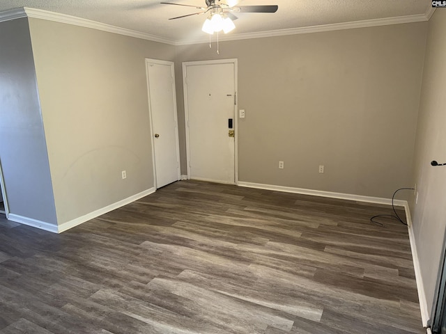 empty room with crown molding, ceiling fan, dark hardwood / wood-style flooring, and a textured ceiling