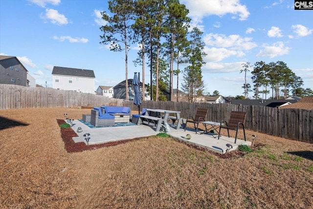 view of yard featuring an outdoor living space and a patio