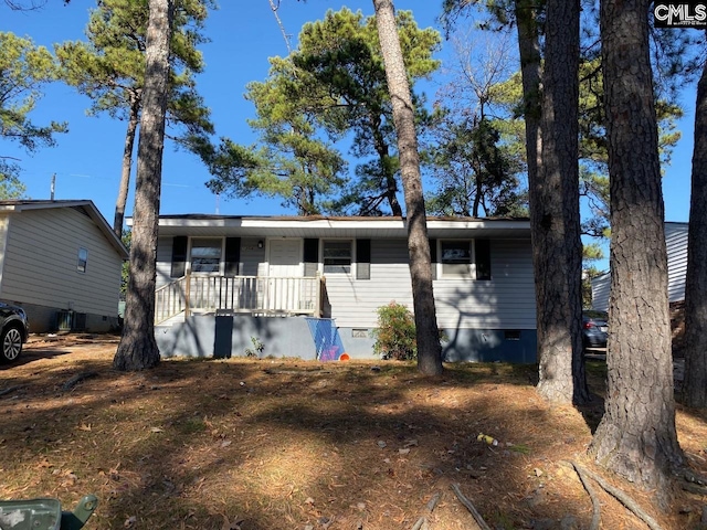 single story home featuring covered porch