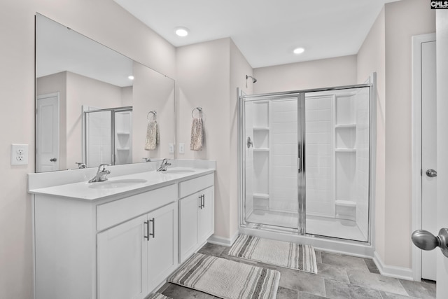 bathroom with vanity and an enclosed shower