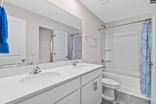 full bathroom featuring toilet, vanity, and shower / bathtub combination with curtain