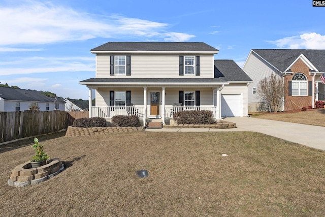 view of front property with a garage, covered porch, and a front yard