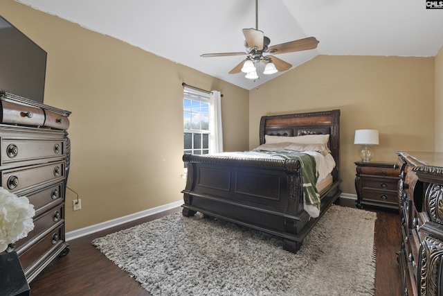 bedroom featuring dark wood-type flooring, lofted ceiling, and ceiling fan