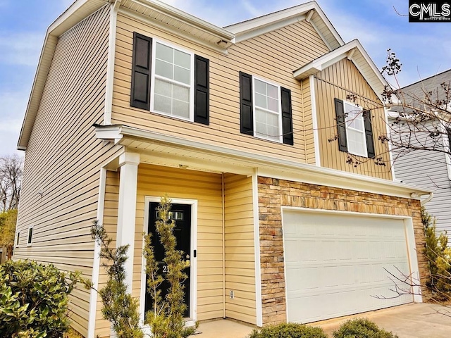 view of front of property featuring a garage