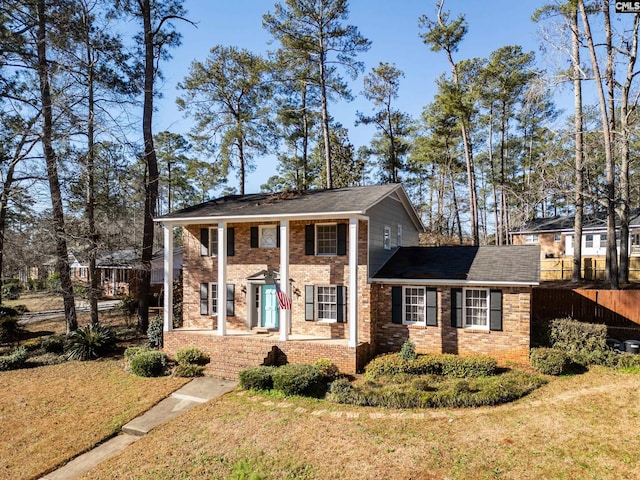 view of front of home with a front lawn