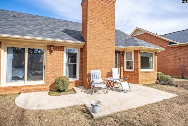 rear view of house featuring a patio area