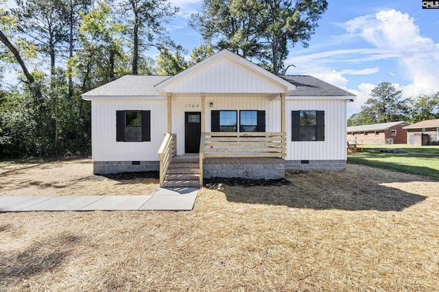 modern inspired farmhouse with a porch