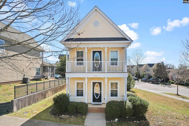 view of front facade with a porch and a balcony