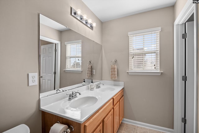 bathroom with vanity and tile patterned flooring