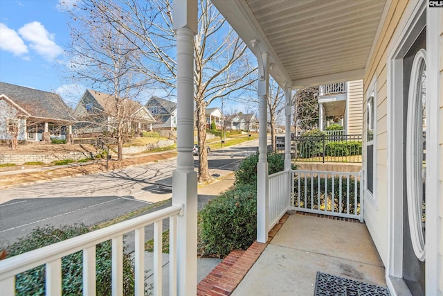 balcony featuring covered porch