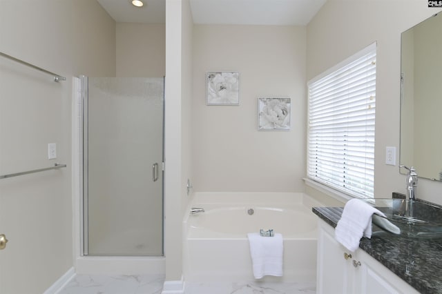 bathroom featuring separate shower and tub and vanity