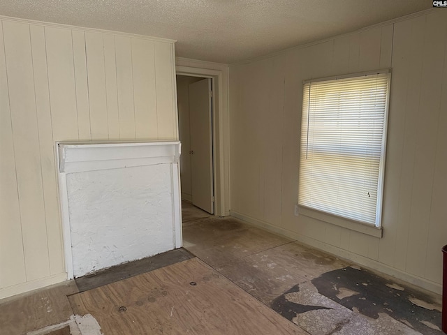 interior space with a textured ceiling