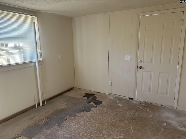 interior space with a textured ceiling