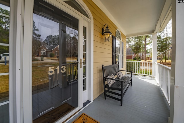 property entrance featuring covered porch