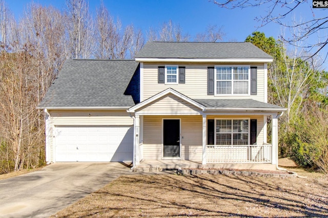 view of front of house with covered porch and a garage