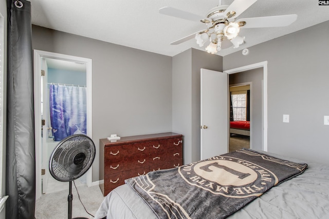 bedroom featuring ceiling fan and carpet flooring