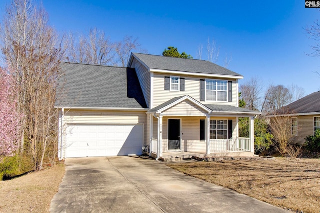 view of front of house featuring a porch and a garage