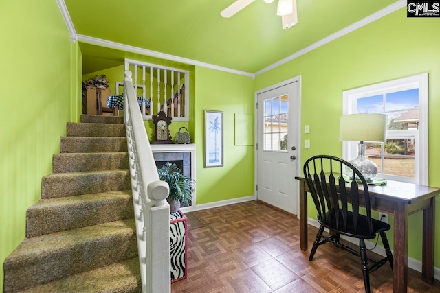 interior space with ceiling fan, ornamental molding, and dark parquet floors